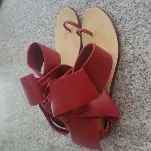 Aminah Abdul Jillil red bow flats